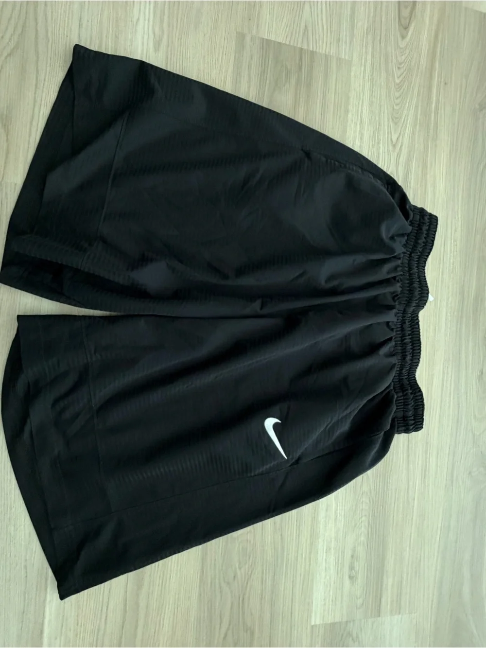 Nike Black Shorts with White Swoosh Logo